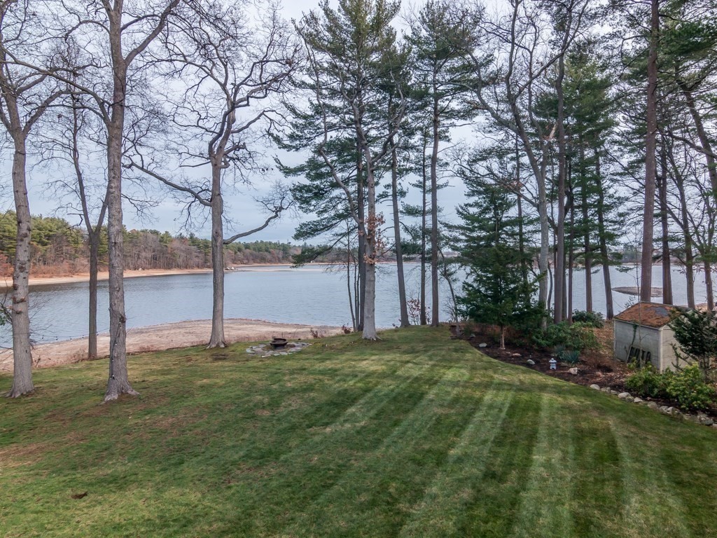 128 Locksley Road Lynnfield, MA 01940 - Photo 30 of 38 a view of a field with trees