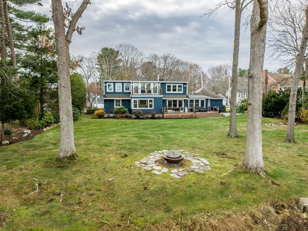 128 Locksley Road Lynnfield, MA 01940 - Photo 32 of 38 a view of a house with backyard and sitting area