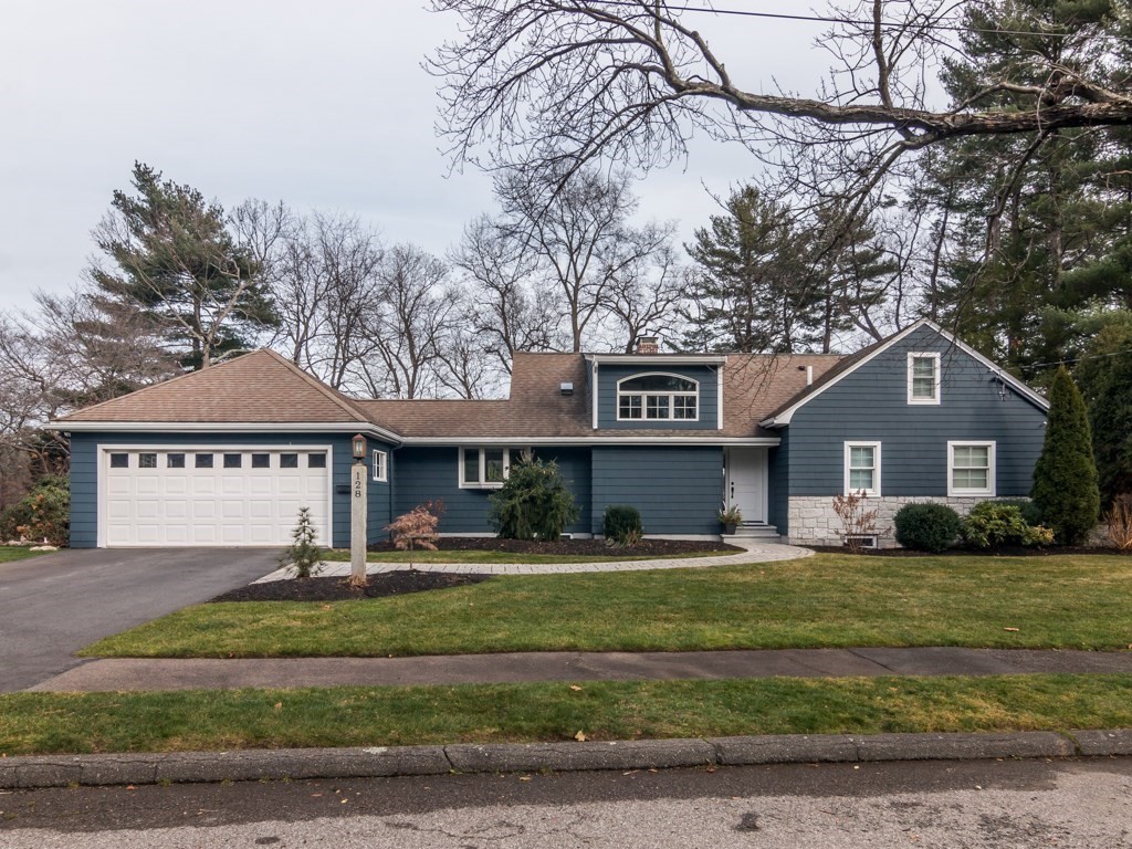128 Locksley Road Lynnfield, MA 01940 - Photo 34 of 38 a front view of a house with a yard