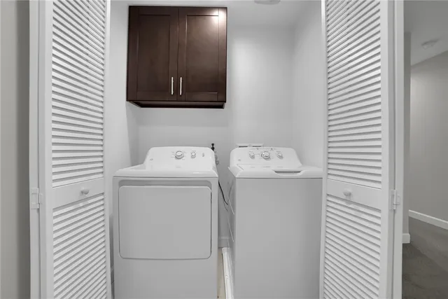 a front view of a house with a street