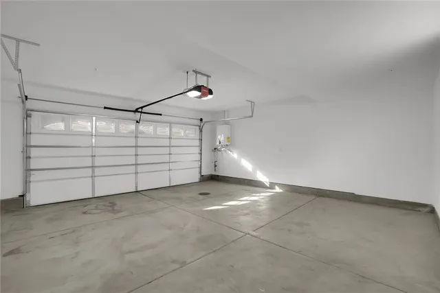 a front view of a house with a street view