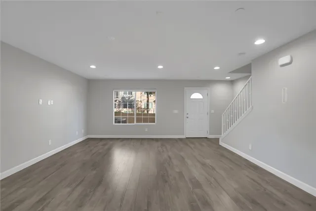 a view of kitchen with wooden floor