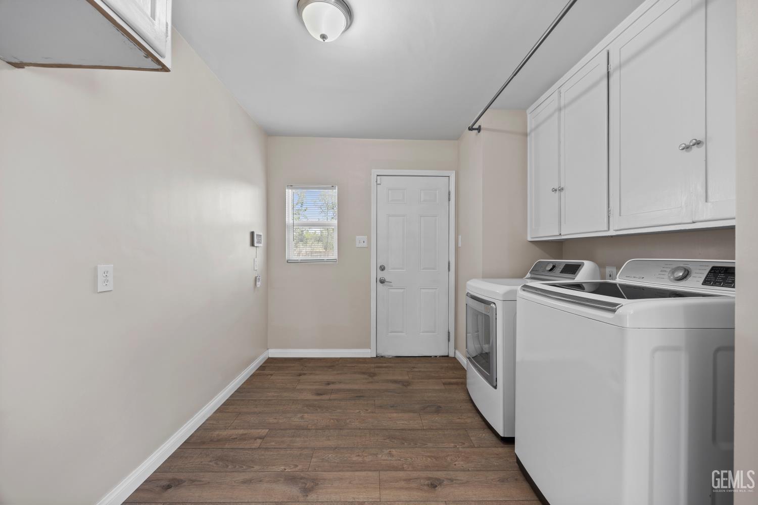 Undisclosed Address Bakersfield, CA 93305 - Photo 23 of 29 a view of a room with washer and dryer