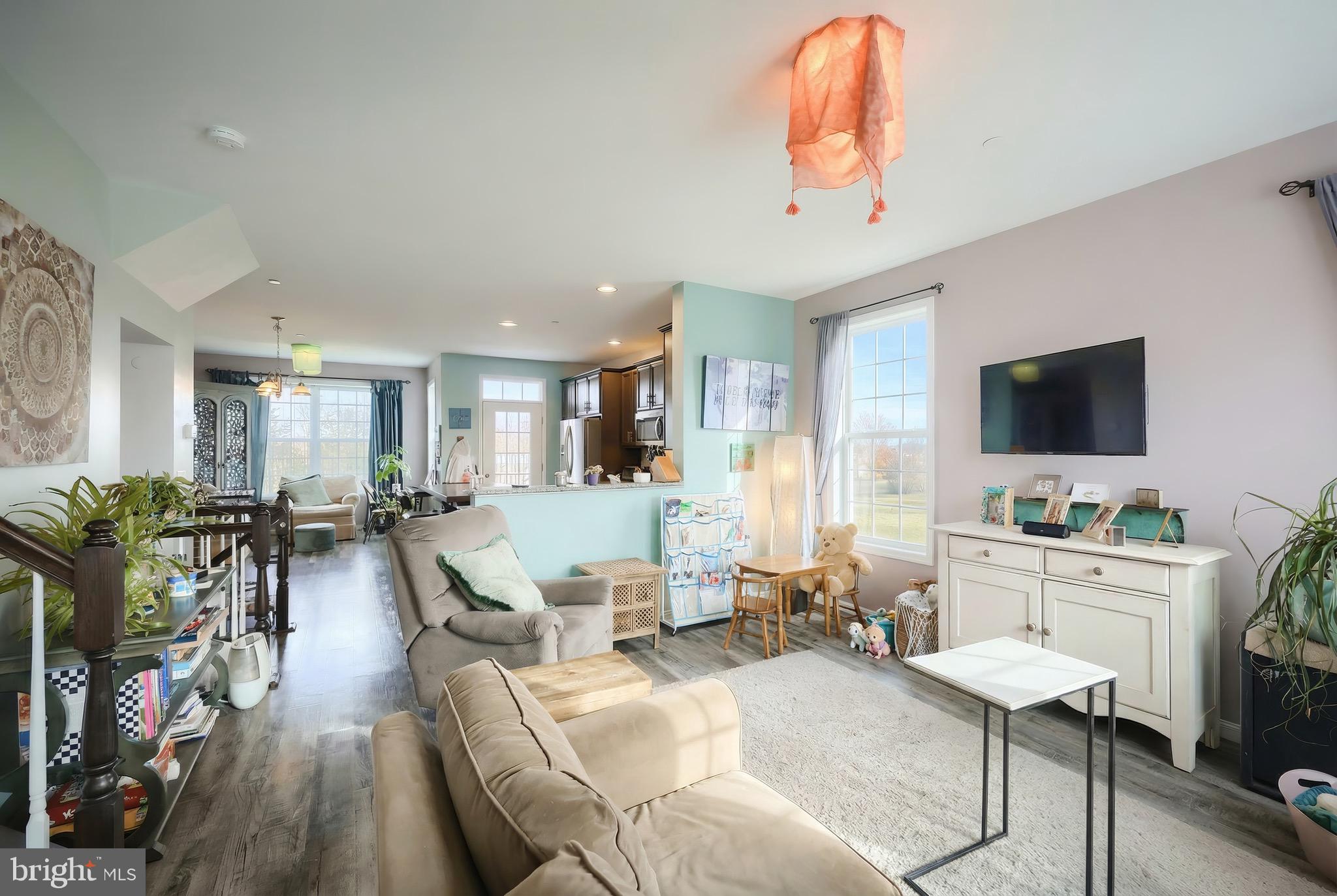 31 Winslow Ct. Gettysburg, PA 17325 - Photo 14 of 45 a living room with furniture a flat screen tv and a window