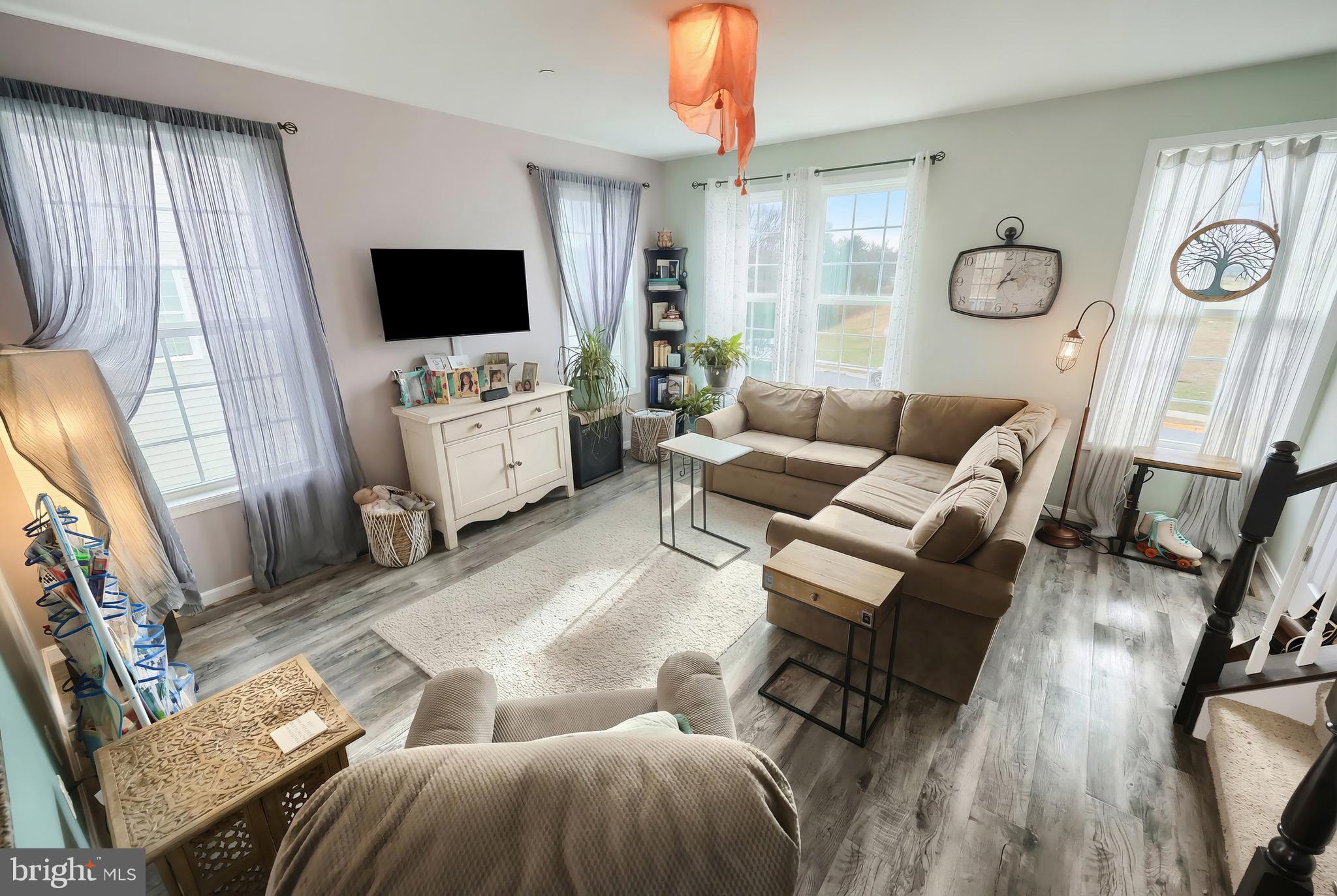 31 Winslow Ct. Gettysburg, PA 17325 - Photo 15 of 45 a living room with furniture and a flat screen tv