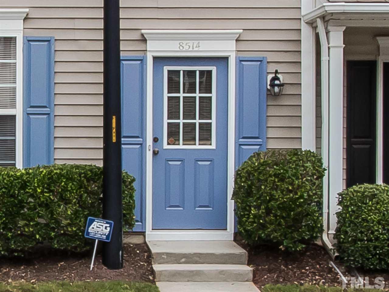 8514 Bright Loop Raleigh, NC 27613 - Photo 2 of 20 a view of a entryway door front of house