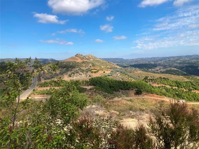 a view of mountain view with mountains in the background