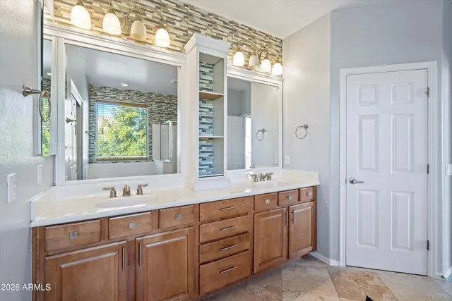 a bathroom with a bathtub and shower