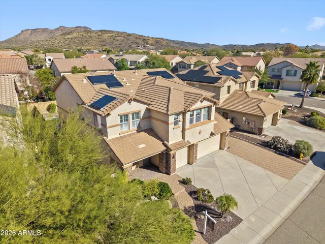 an aerial view of a house with a garden