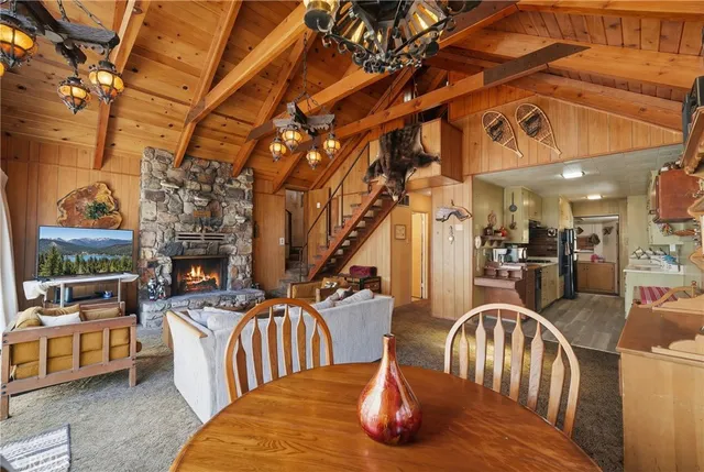 a view of a couches and dinning table in the balcony