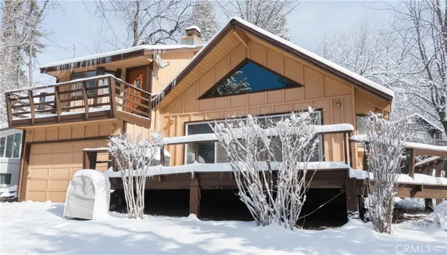 a front view of a house with parking