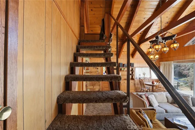 a view of balcony with furniture