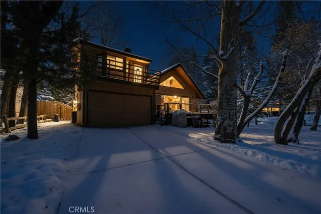 a view of a house with a street