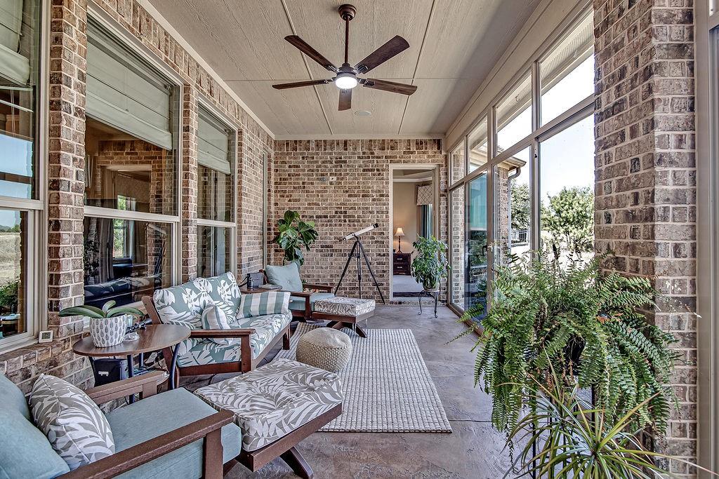 117 Citation Drive Cresson, TX 76035 - Photo 31 of 40 View of patio with ceiling fan and an outdoor living space