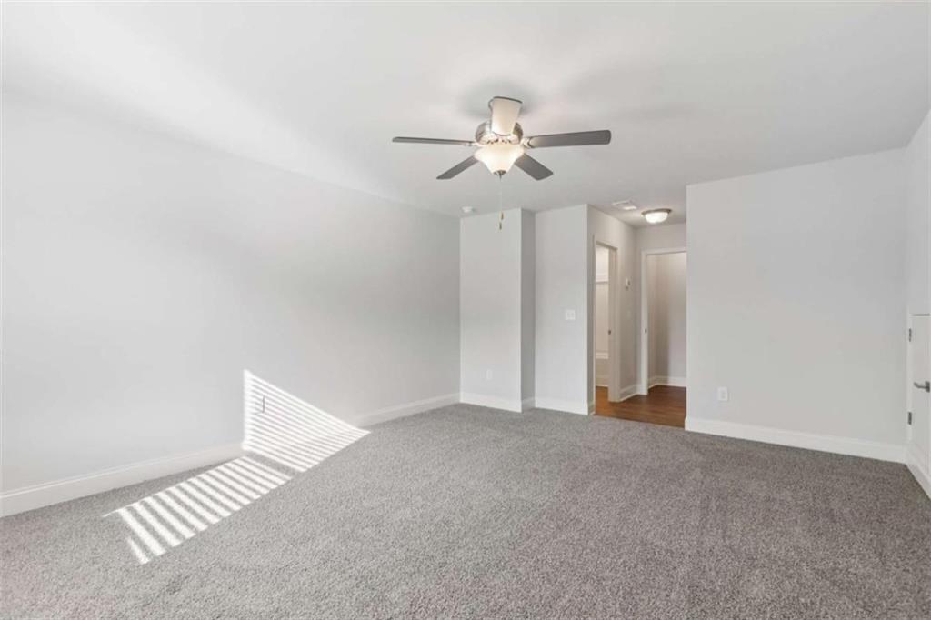 1833 Millstone Manor Conyers, GA 30013 - Photo 33 of 50 a view of an empty room