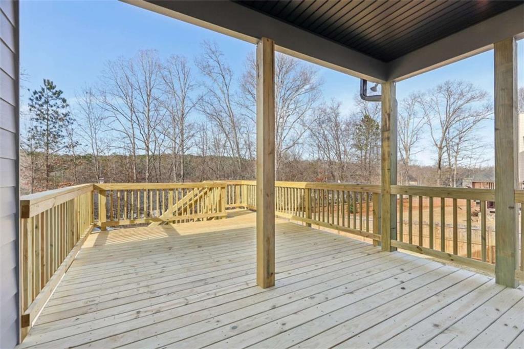 1833 Millstone Manor Conyers, GA 30013 - Photo 37 of 50 a view of balcony with wooden floor
