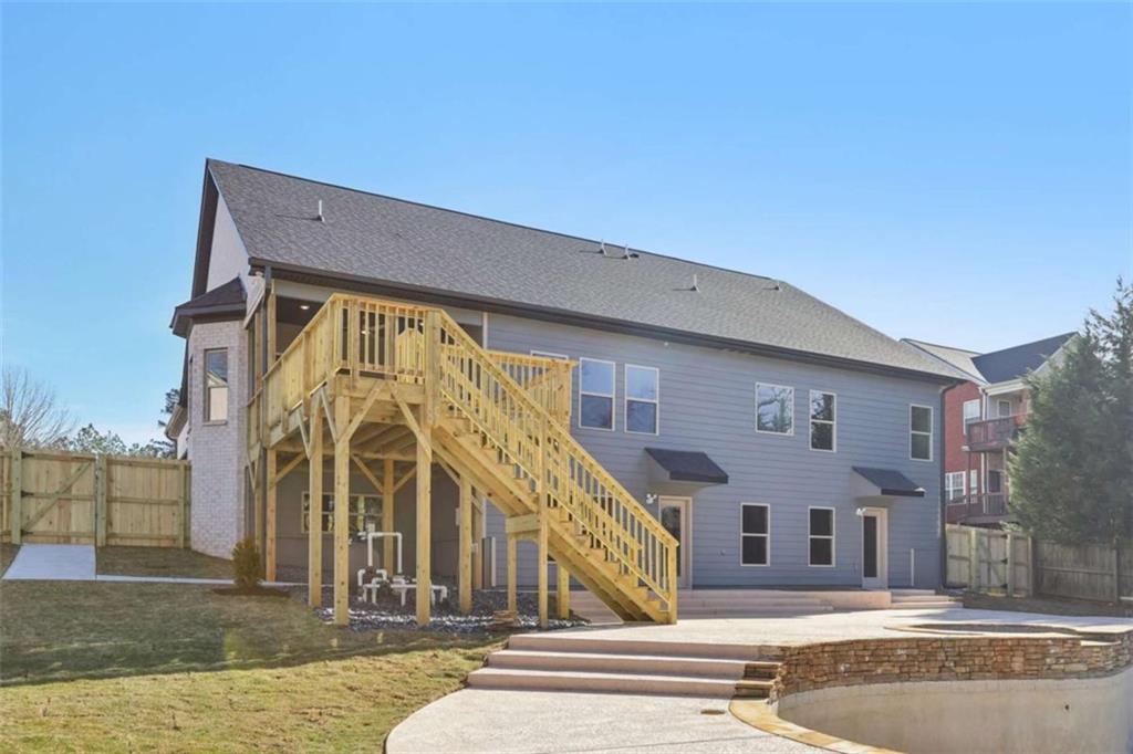1833 Millstone Manor Conyers, GA 30013 - Photo 41 of 50 a view of a building with a swimming pool