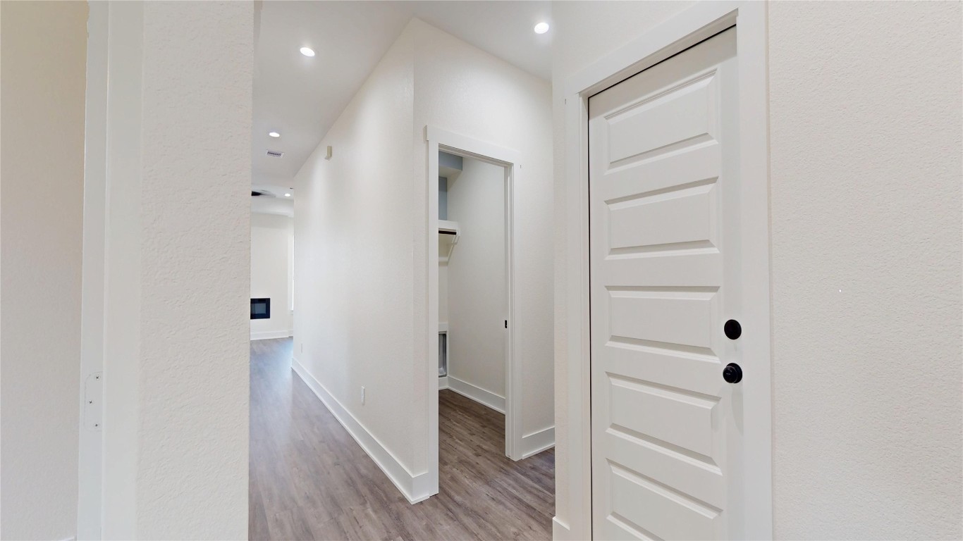 5119 Selinsky Road Houston, TX 77048 - Photo 3 of 45 a view of a hallway with wooden floor