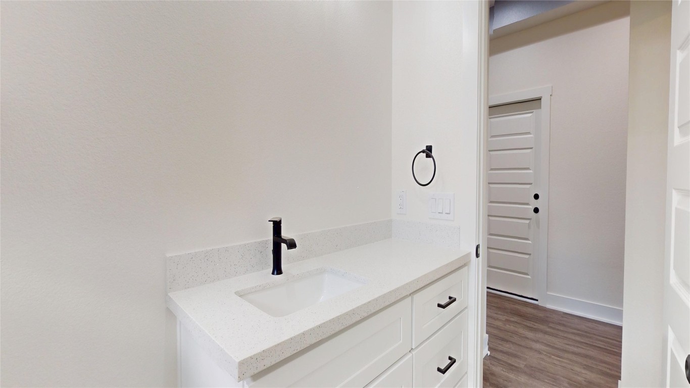 5119 Selinsky Road Houston, TX 77048 - Photo 6 of 45 a bathroom with a sink and a mirror