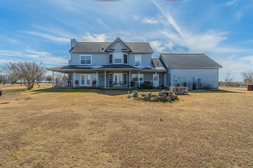 6438 Farm To Market 4 Godley, TX 76044 - Photo 2 of 32 a front view of a house with a yard