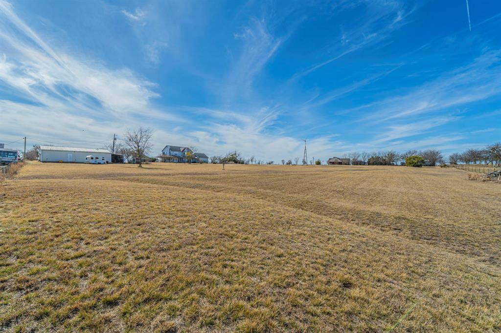 6438 Farm To Market 4 Godley, TX 76044 - Photo 28 of 32 a view of an ocean and beach
