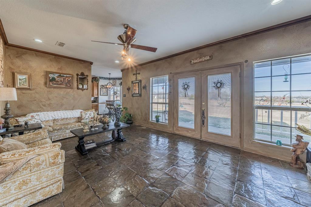 6438 Farm To Market 4 Godley, TX 76044 - Photo 5 of 32 a living room with furniture and large windows