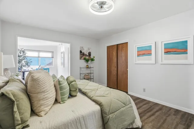 a bathroom with a sink toilet tub and shower