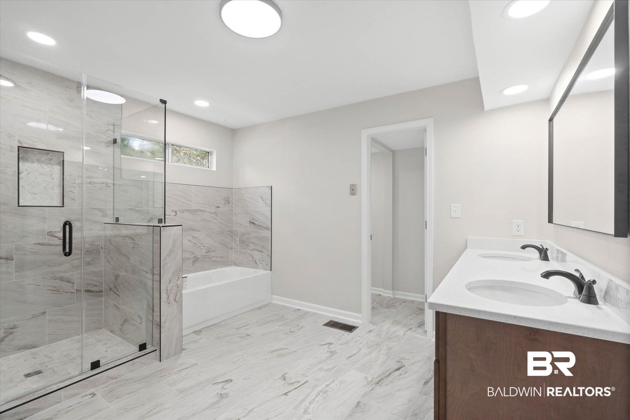 106 Melanie Loop Daphne, AL 36526 - Photo 14 of 45 Full bath featuring a bath, a marble finish shower, double vanity, and recessed lighting