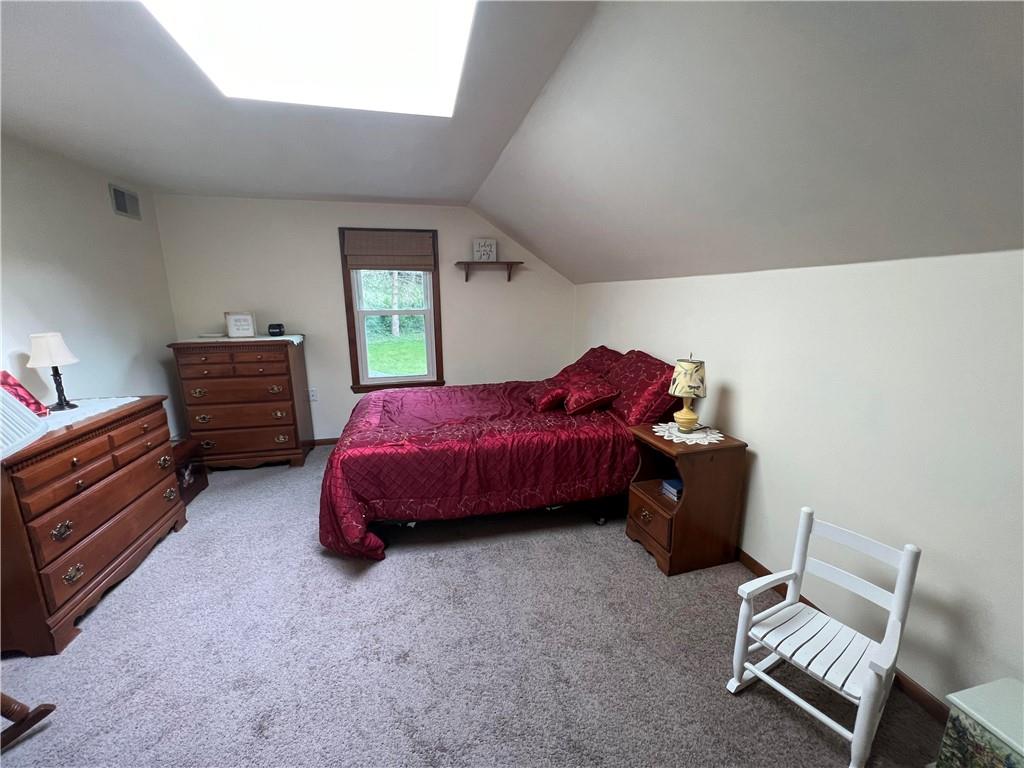 1214 Slate Point Road Vandergrift, PA 15690 - Photo 26 of 47 a bed room with a bed and a chair