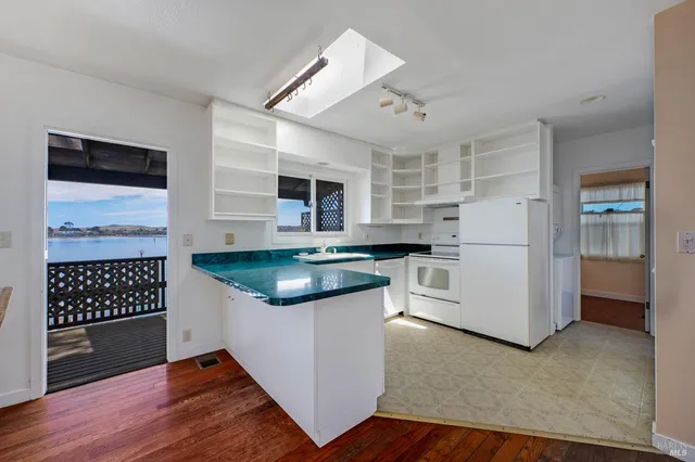 a bathroom with a sink and a window