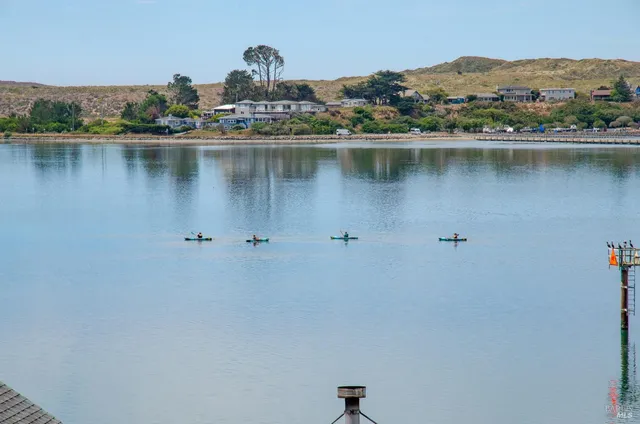a view of a lake with houses