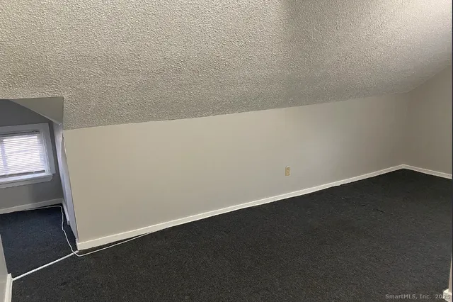 an empty room with a door