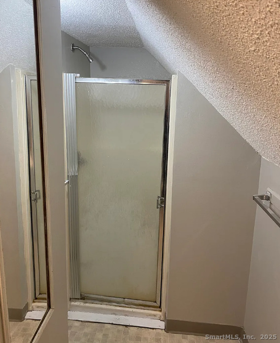 Undisclosed Address Bridgeport, CT 06610 - Photo 8 of 8 a bathroom with a glass shower door