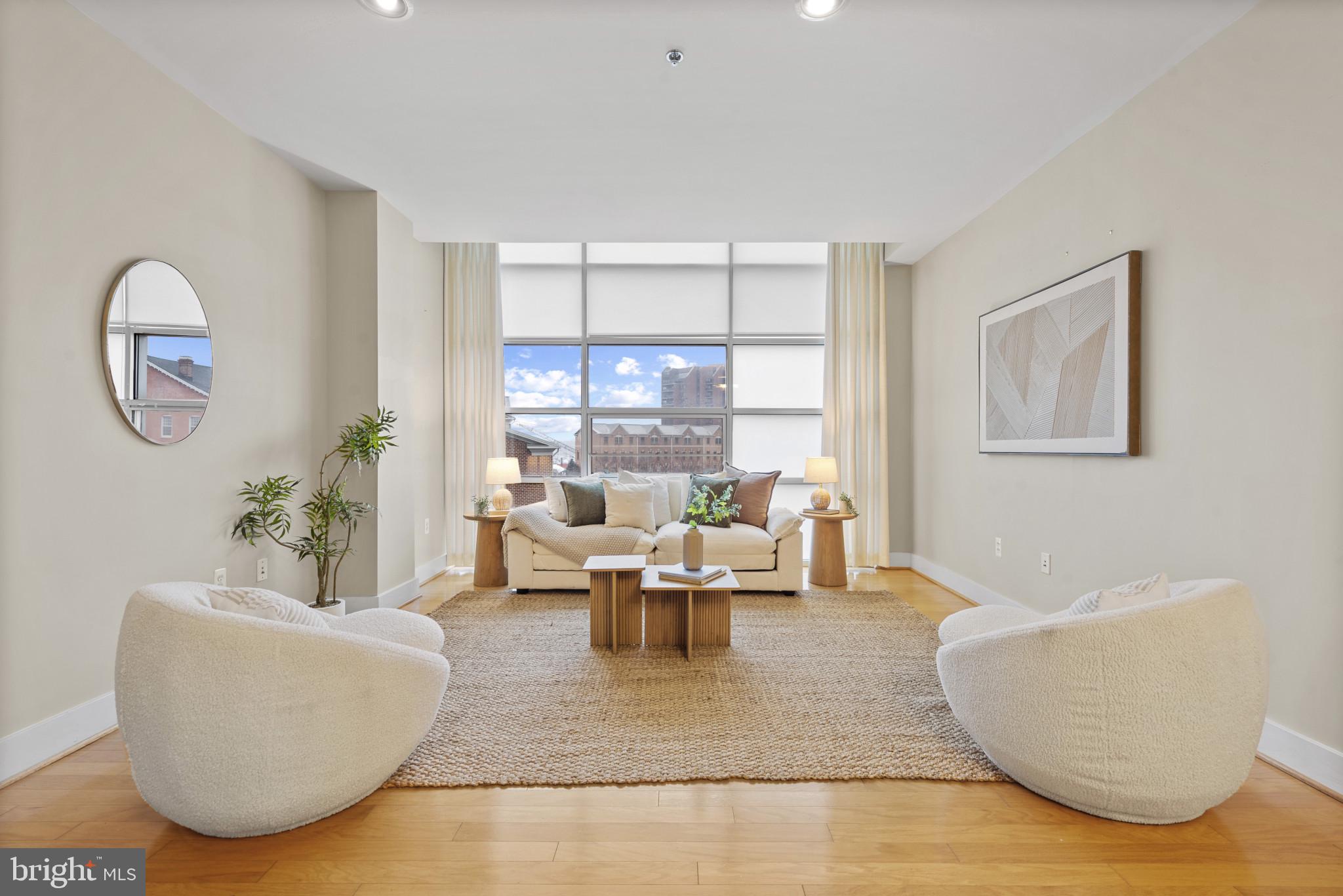 2772 Lighthouse Point East, Unit 303 Baltimore, MD 21224 - Photo 11 of 35 Floor to ceiling windows.