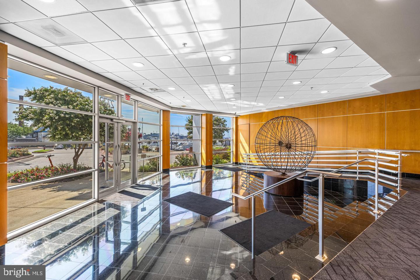 2772 Lighthouse Point East, Unit 303 Baltimore, MD 21224 - Photo 28 of 35 Secure building with security.