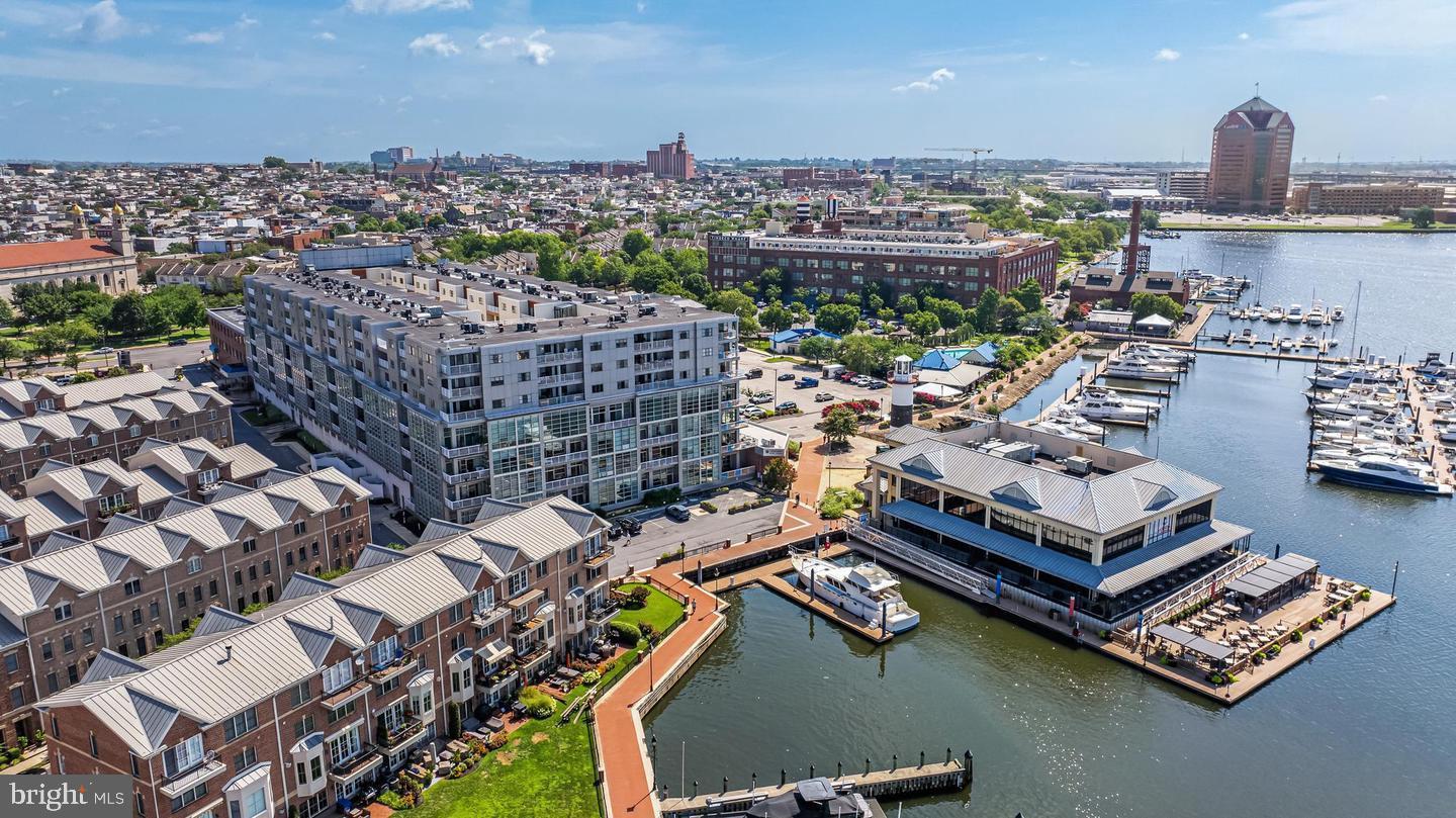 2772 Lighthouse Point East, Unit 303 Baltimore, MD 21224 - Photo 33 of 35 Ten steps to the waterfront promenade.