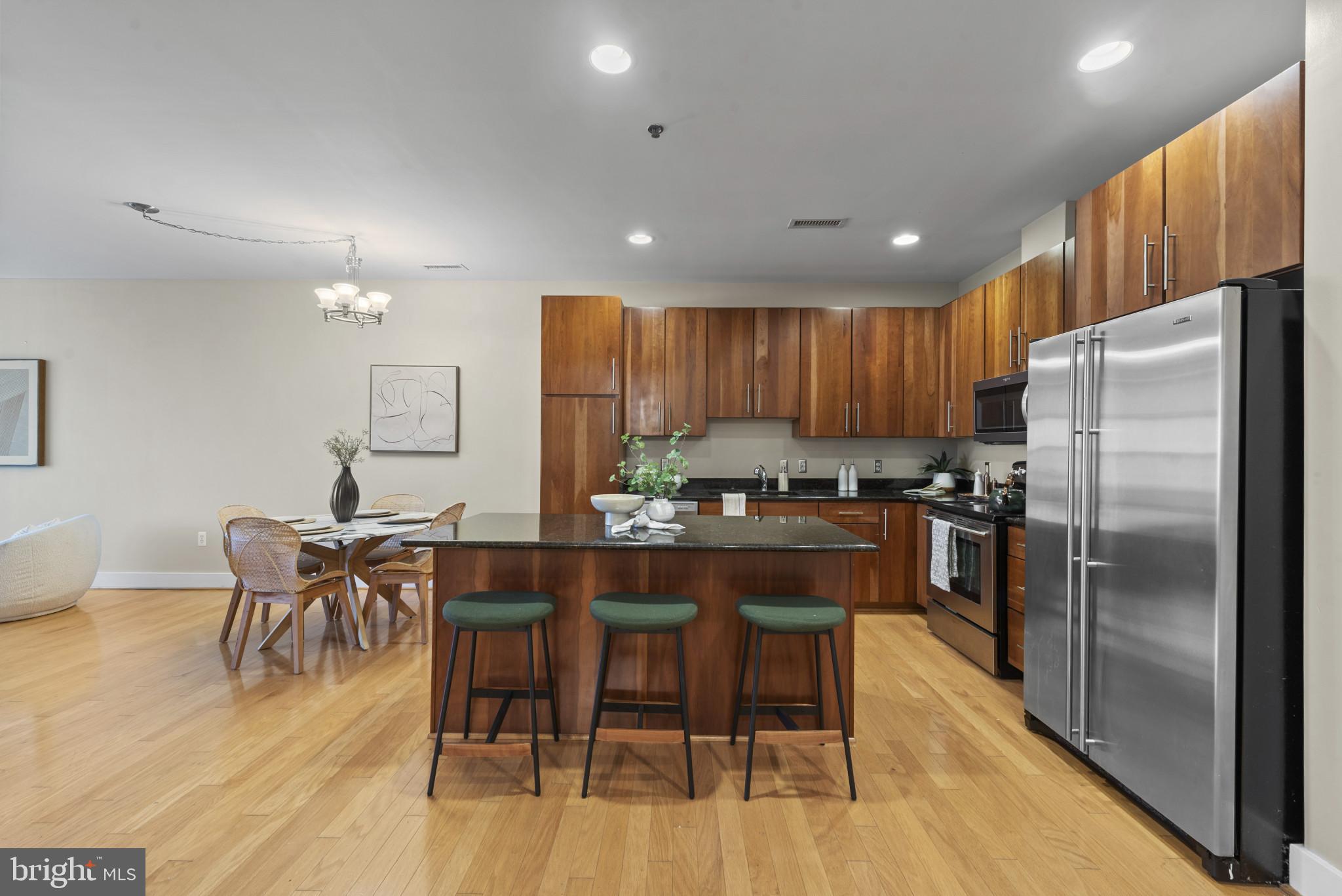 2772 Lighthouse Point East, Unit 303 Baltimore, MD 21224 - Photo 4 of 35 Natural toned kitchen.