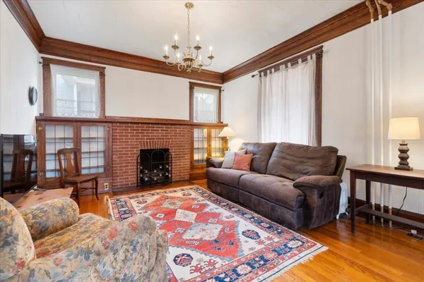 a view of a room with gym equipment and a window