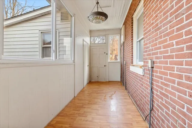a view of walk in closet with window