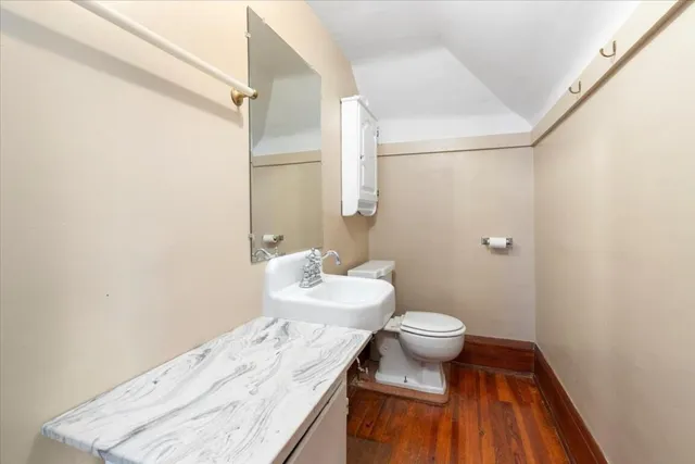 an aerial view of residential houses with yard