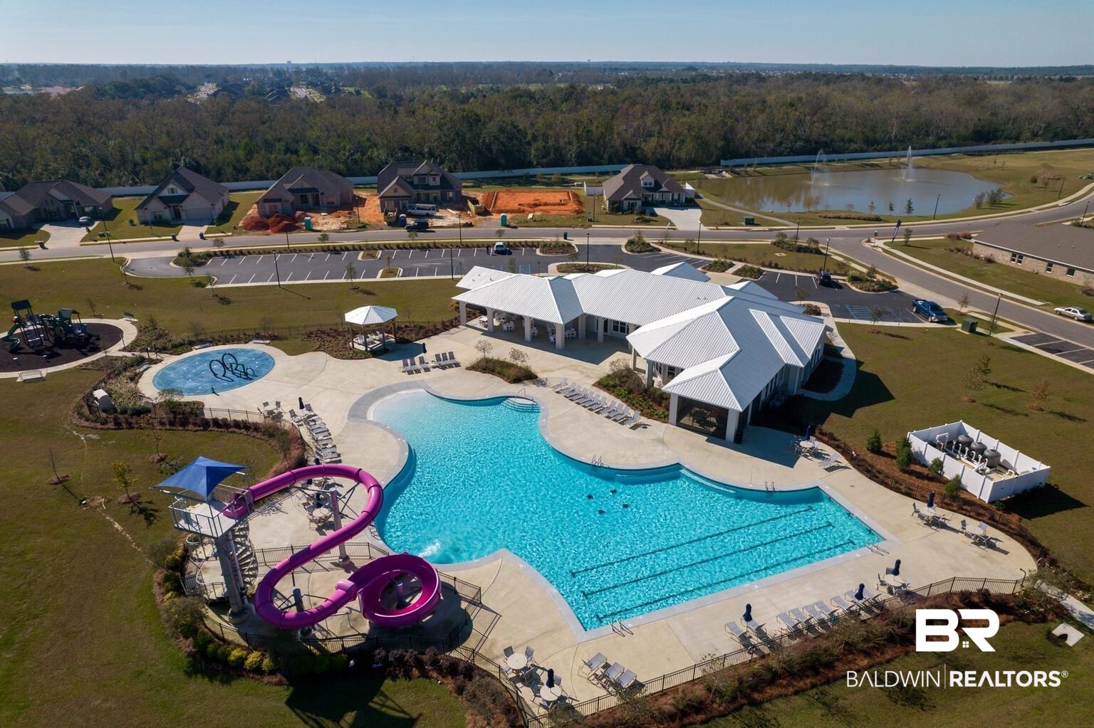 23952 Citation Loop Daphne, AL 36526 - Photo 62 of 69 Drone / aerial view of a pool and a heavily wooded area