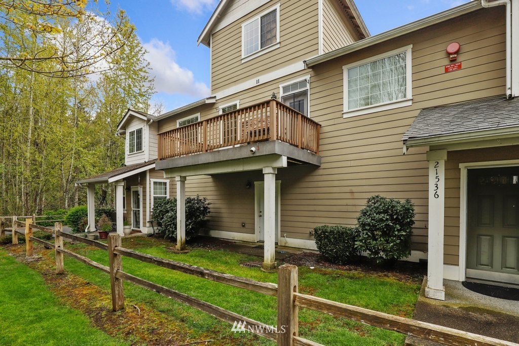 21532 11th Court Southeast Bothell, WA 98021 - Photo 2 of 36 a view of a house with yard and furniture