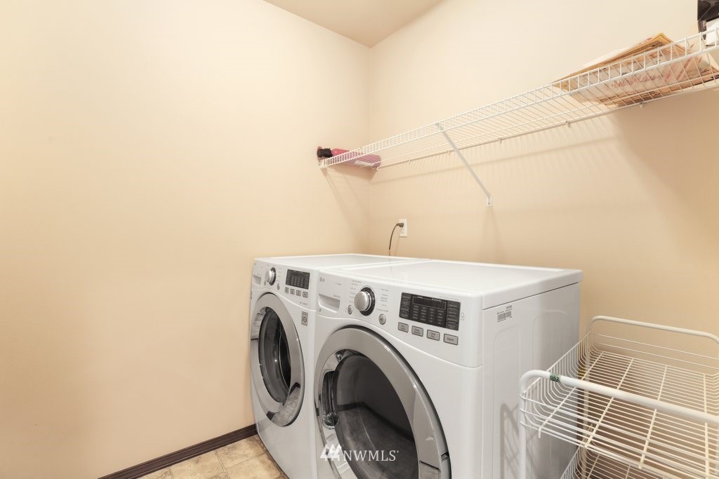 21532 11th Court Southeast Bothell, WA 98021 - Photo 21 of 36 a utility room with dryer and washer