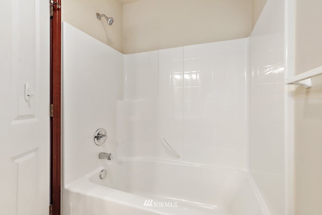 21532 11th Court Southeast Bothell, WA 98021 - Photo 25 of 36 a bathroom with a bathtub