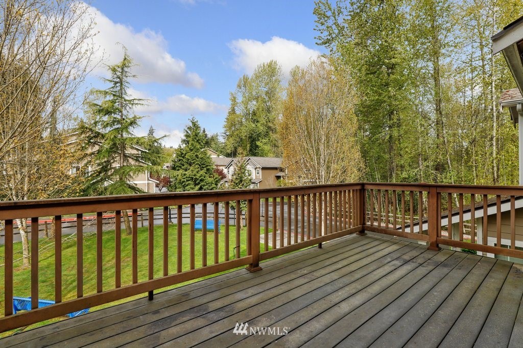 21532 11th Court Southeast Bothell, WA 98021 - Photo 29 of 36 a view of balcony with wooden floor