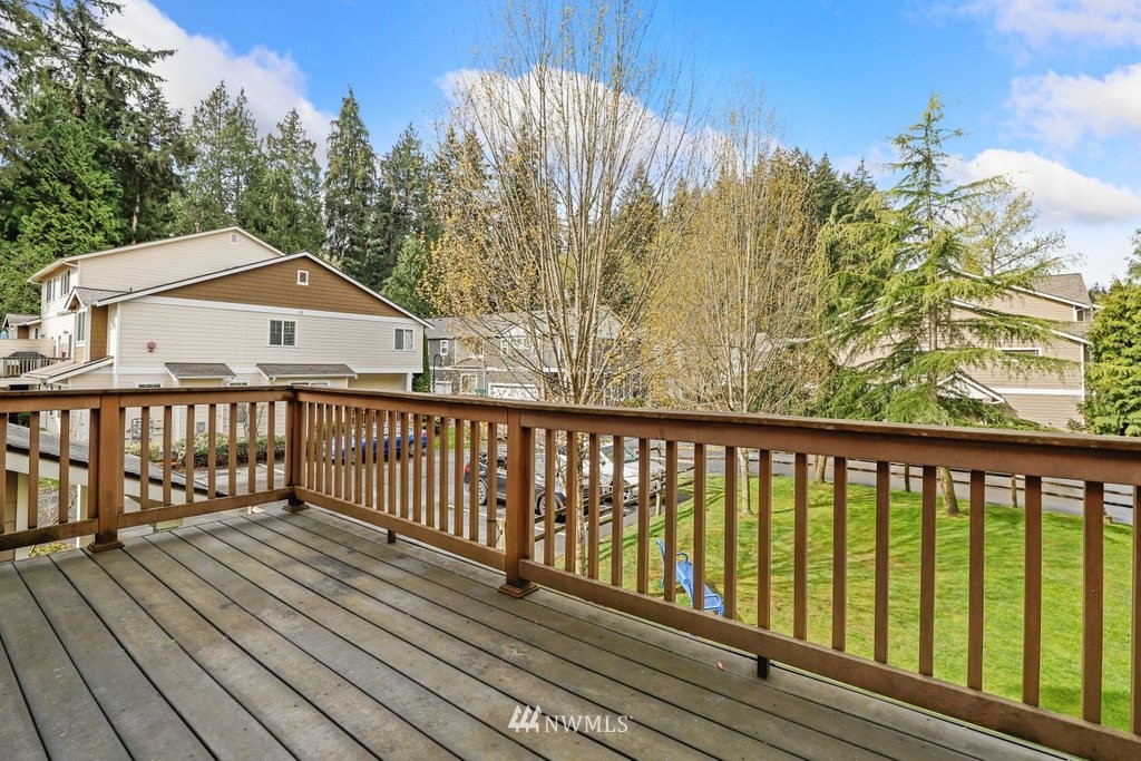 21532 11th Court Southeast Bothell, WA 98021 - Photo 32 of 36 a view of a street with wooden fence