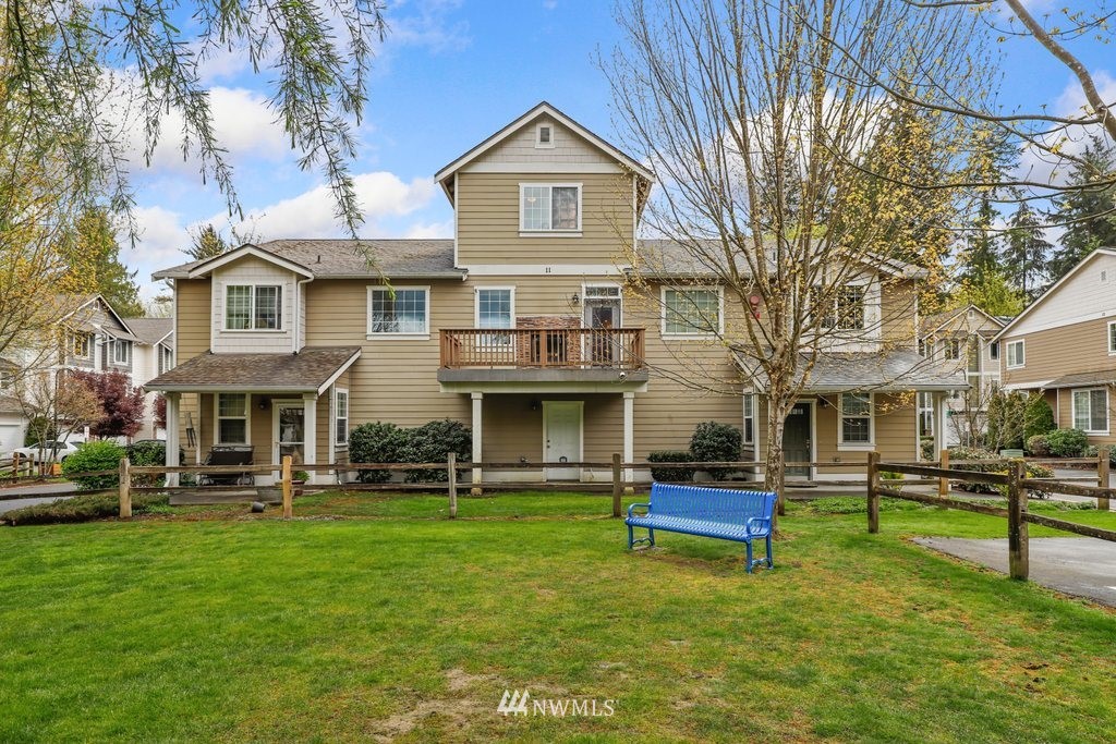 21532 11th Court Southeast Bothell, WA 98021 - Photo 33 of 36 a front view of a house with a yard