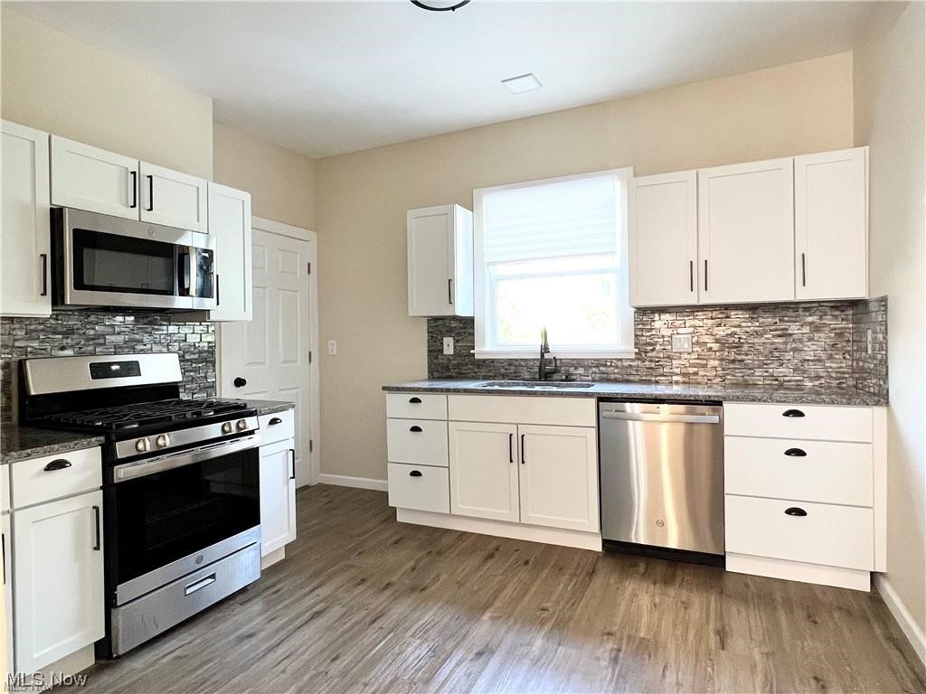 2402 Noble Road Cleveland, OH 44121 - Photo 12 of 29