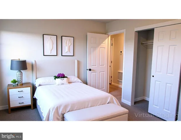 a view of bathroom with wooden floor