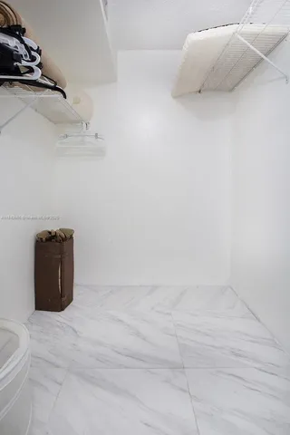 a en suite bathroom with a toilet